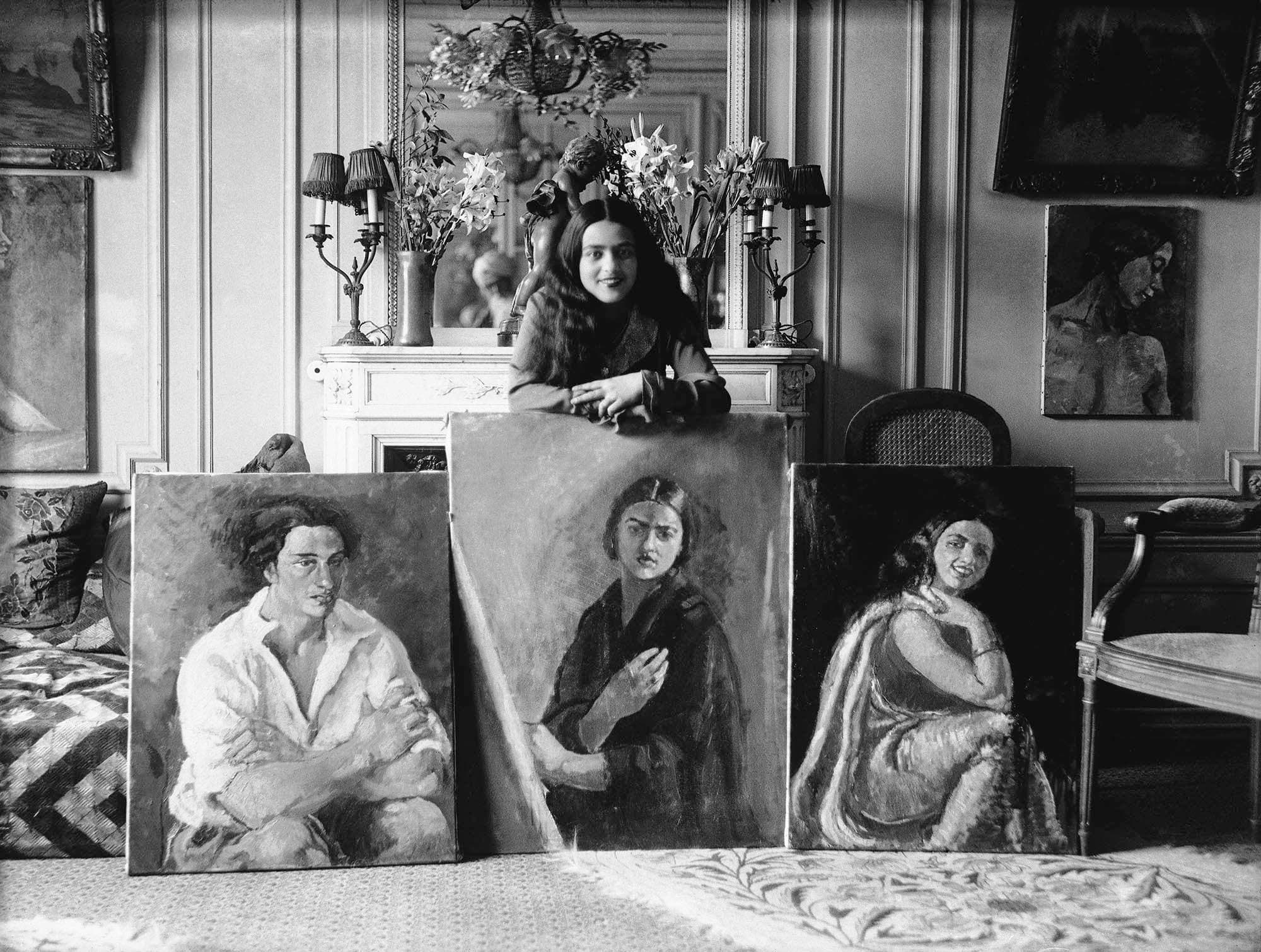 Amrita_Sher-Gil_with_3_paintings
