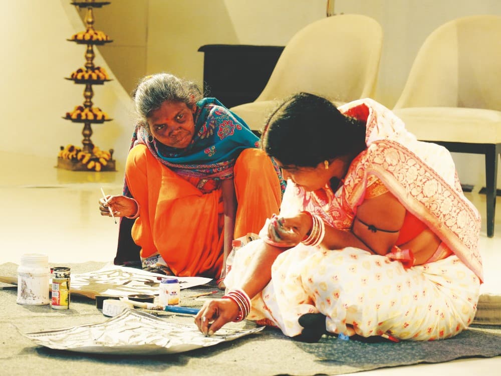 Putli Ganju, left, shows the nuances of her art form, along with fellow artist Anita Devi, during a workshop at the Kolkata Centre for Creativity.