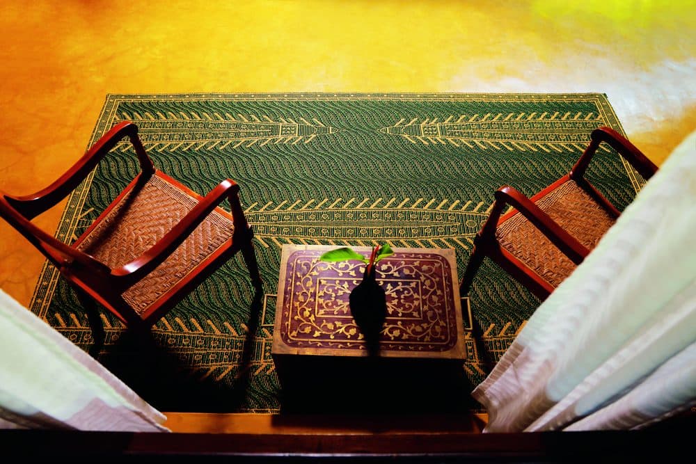 The Kerala Vallamkali collection in sisal, Ola green and Kasavu gold, embodying the grandeur and elegance of the state