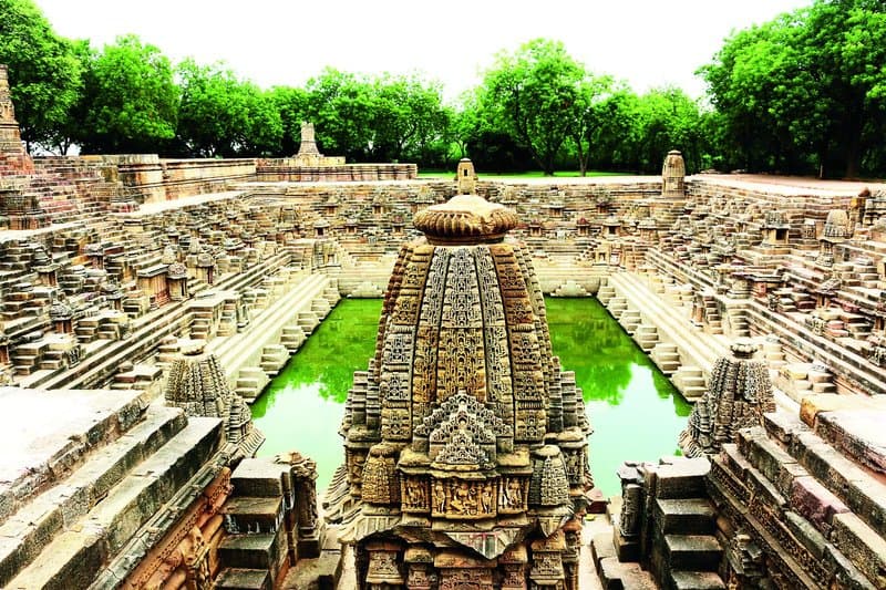 The Modhera Sun Temple in Gujarat, positioned on the Tropic of Cancer, is oriented so that the first rays of the equinox sun travel its halls to strike a golden image of Surya twice a year, with the punctuality of a well-set clock.