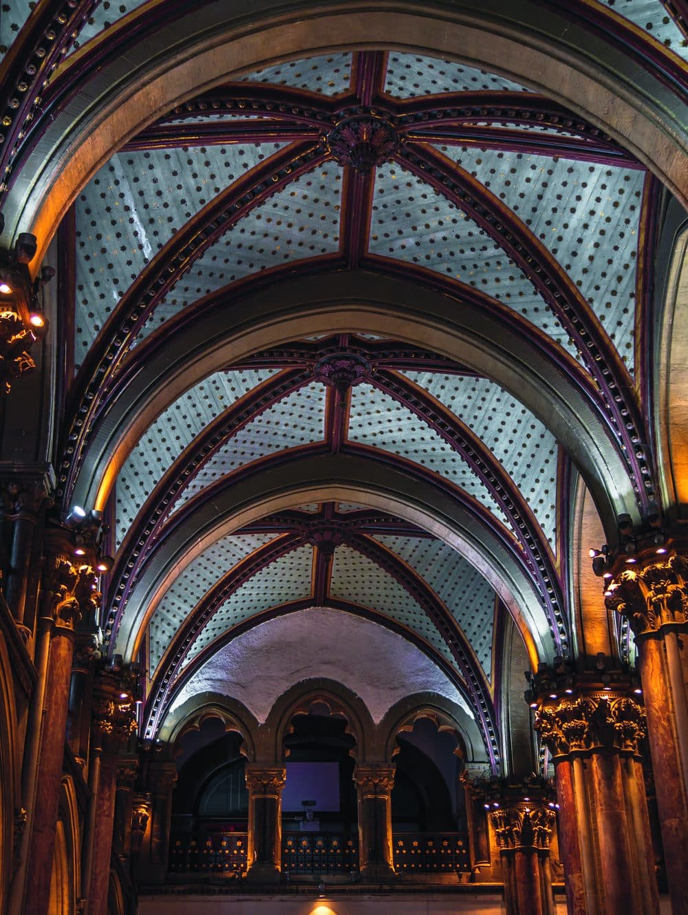 The arched roof design and stained glass facade are some of the details hidden in plain sight as millions of travellers walk in and out of its historic gates